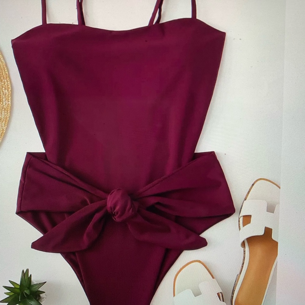 Cute plum colored one piece.